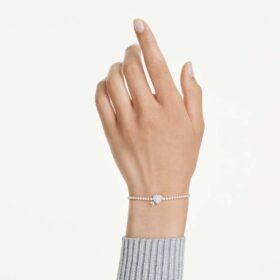 Pulseira Idyllia com cortes mistos, coração com seta, branca, banhada a dourado Pulseira Idyllia com cortes mistos, coração com seta, branca, banhada a dourado