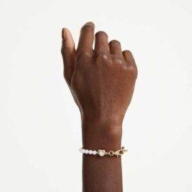 Pulseira Idyllia com pérola de cristal, branca, banhada a dourado Pulseira Idyllia com pérola de cristal, branca, banhada a dourado