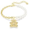 Pulseira Idyllia com pérola de cristal, corte redondo, ursinho, tom dourado, banhada a ouro Pulseira Idyllia com pérola de cristal, corte redondo, ursinho, tom dourado, banhada a ouro