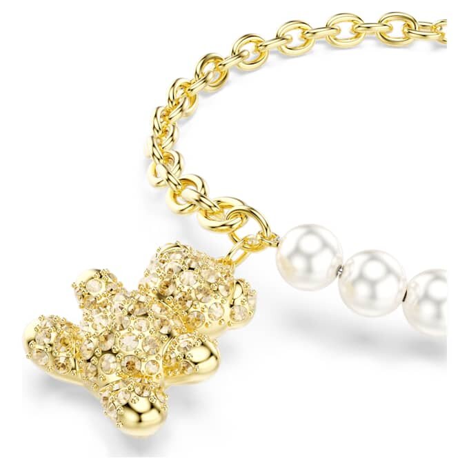 Pulseira Idyllia com pérola de cristal, corte redondo, ursinho, tom dourado, banhada a ouro Pulseira Idyllia com pérola de cristal, corte redondo, ursinho, tom dourado, banhada a ouro