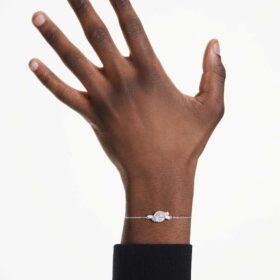Pulseira Matrix com corte baguete, nó, branca, banhada a ródio Pulseira Matrix com corte baguete, nó, branca, banhada a ródio