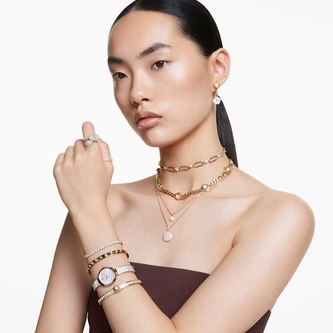 Pulseira Numina com corte redondo, branca, banhada a dourado Pulseira Numina com corte redondo, branca, banhada a dourado
