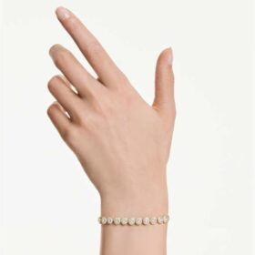 Pulseira Una Angelic com cristais de corte redondo, branca, banhada a dourado Pulseira Una Angelic com cristais de corte redondo, branca, banhada a dourado